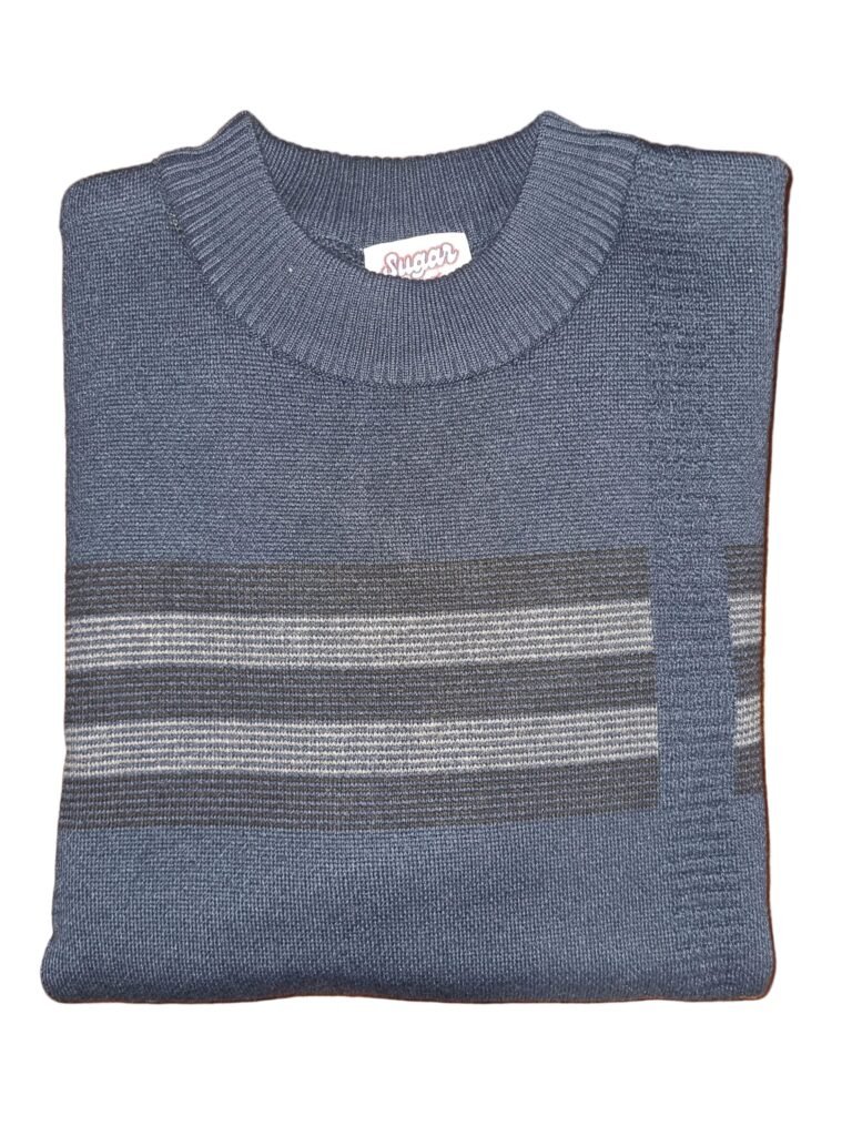 Folded blue sweater with striped pattern on a wooden surface