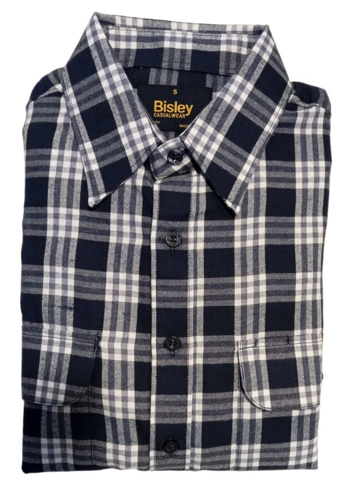 Folded navy and white checkered shirt on a white surface