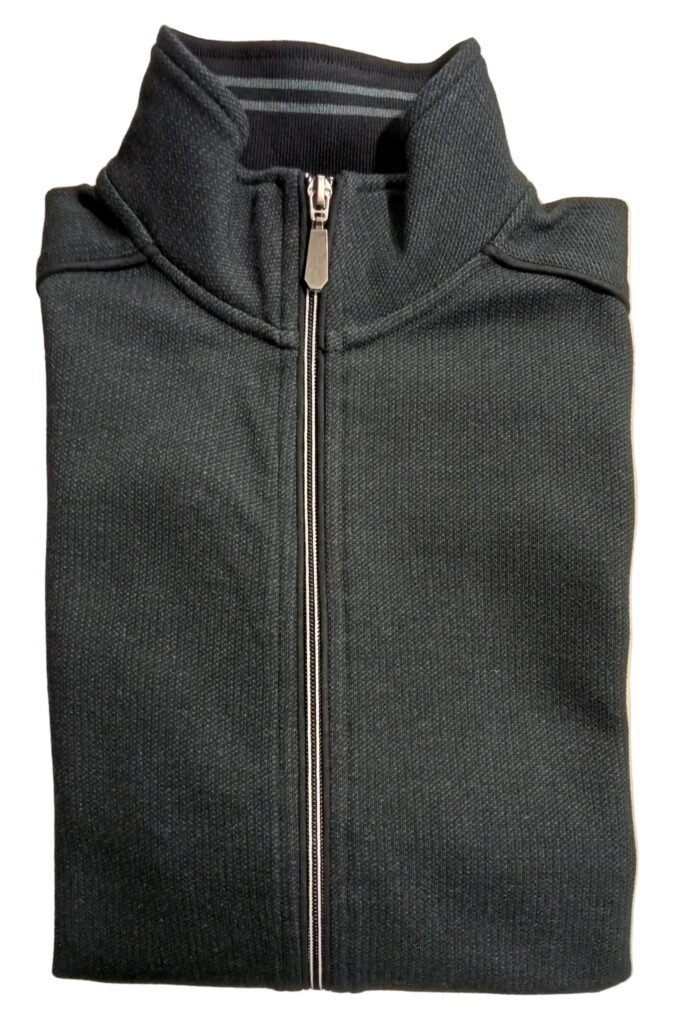 Folded gray jacket with a zipper on a white background