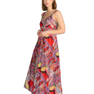 Woman wearing a colorful patterned dress on a white background