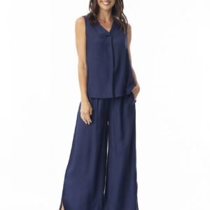 Woman wearing a navy blue sleeveless top and wide-leg pants on a white background